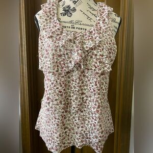 Roses & Lace Ruffled Sleeveless Top So friggin good.